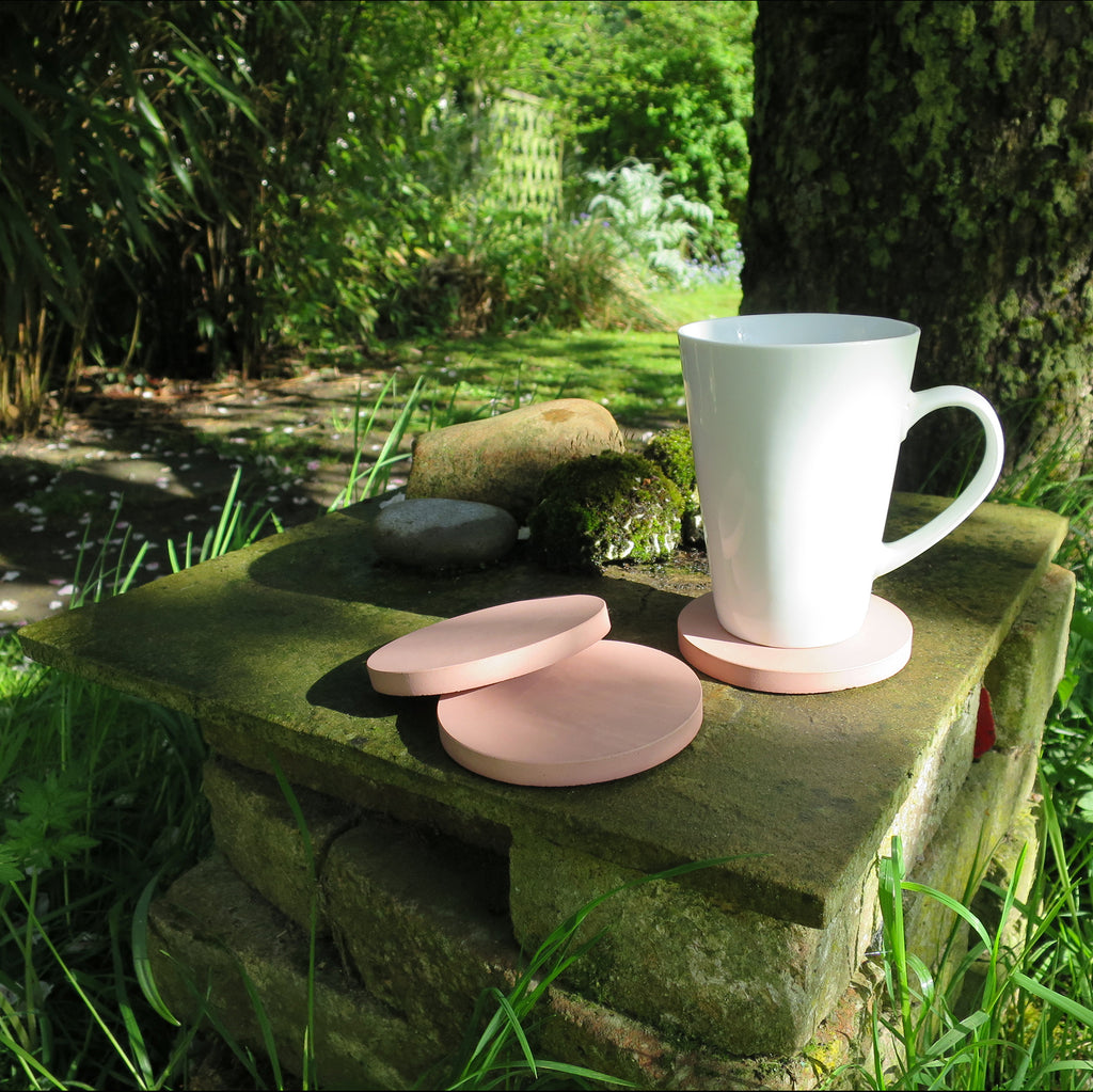 handmade blush pink concrete coaster set of four tableware lifestyle