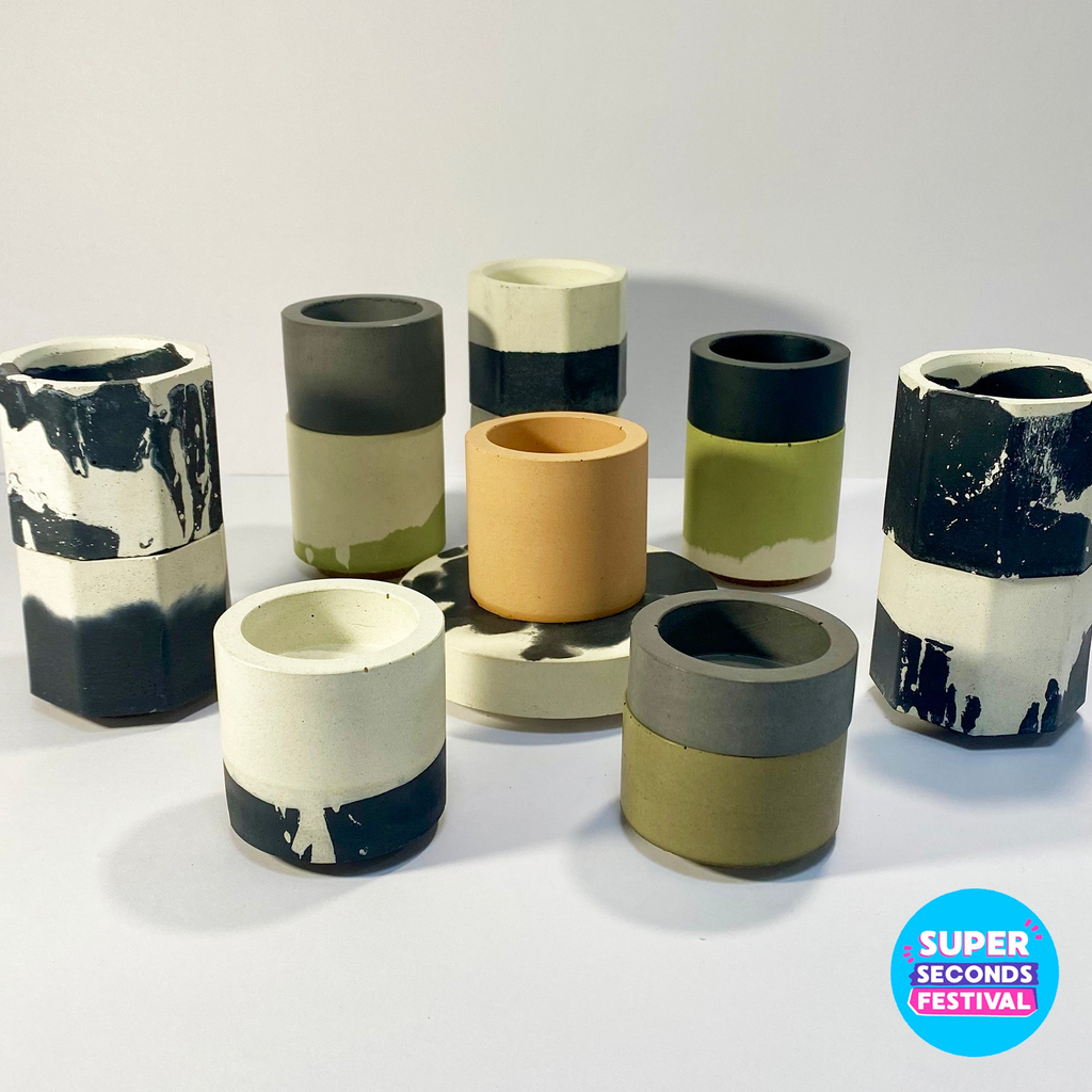 concrete and wax super seconds festival group of mini concrete candle  holders