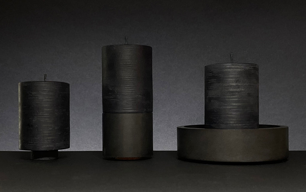 concrete and wax limited edition handmade blackout collection black concrete candle holders and fragranced black pillar candles