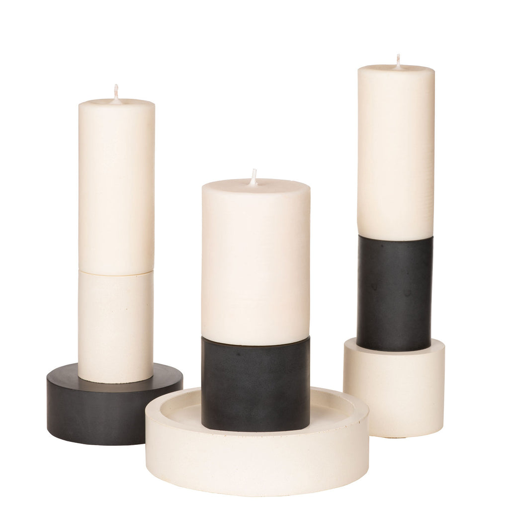 concrete and wax handmade modular and stackable candles and holders