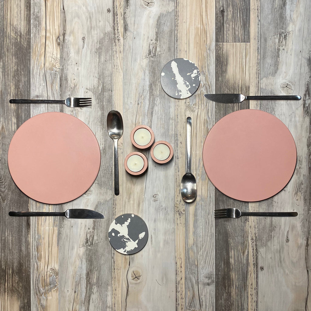 concrete and wax handmade blush pink and grey splatter concrete coasters placemats and tealight holders tableware design