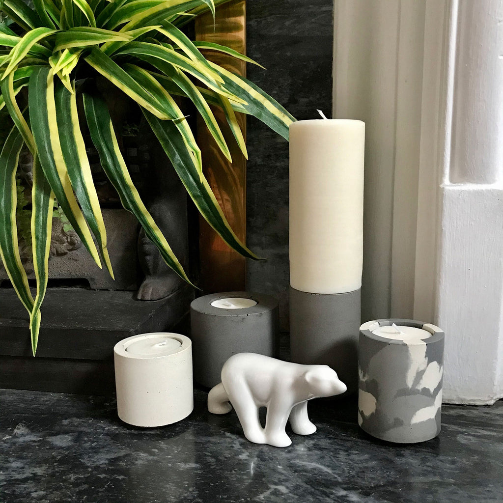 concrete and wax handmade monochrome candleware arrangement
