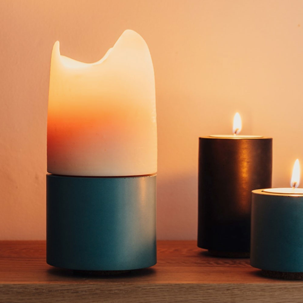 concrete and wax handmade teal blue mid concrete tealight holder and fragranced pillar candle