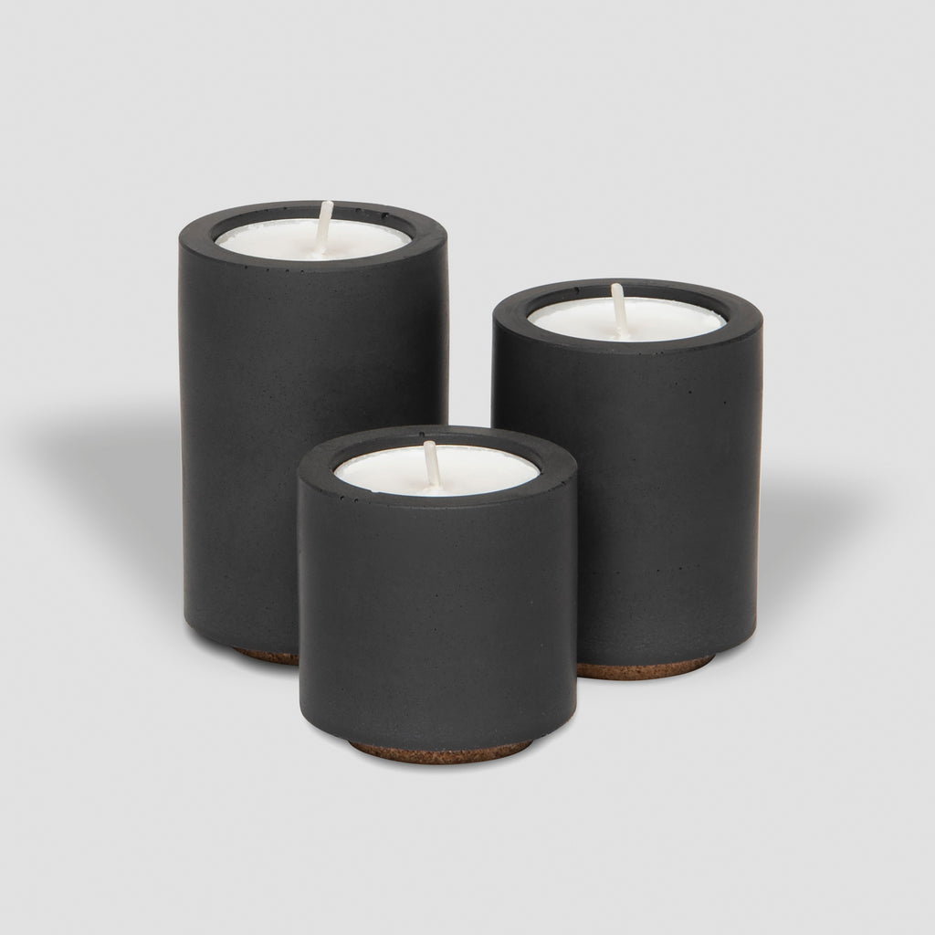 concrete and wax handmade black trio of concrete tealight and candle holders homeware gift