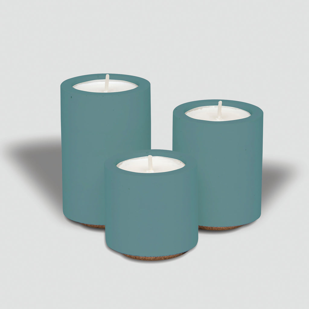 concrete and wax handmade teal blue trio of concrete tealight and candle holders homeware gift